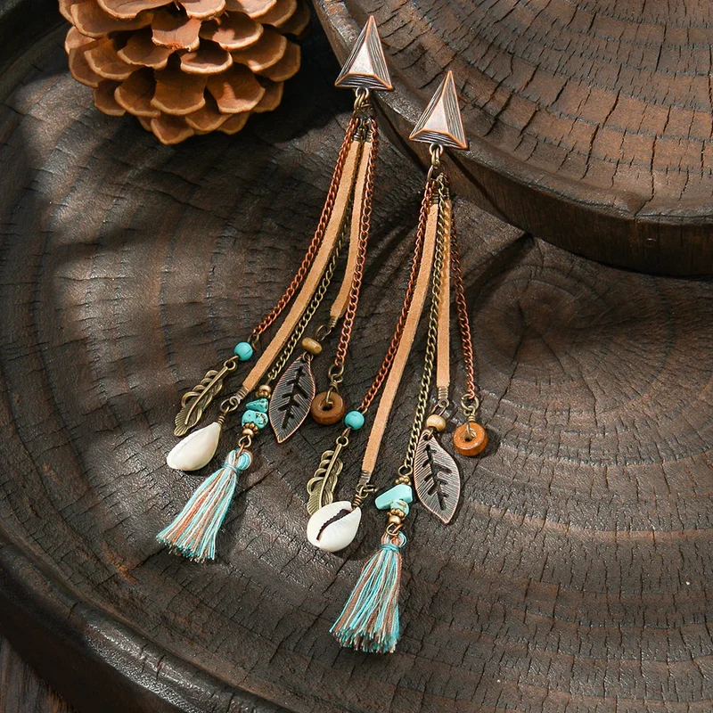 Boucles d'Oreilles avec Pompoms