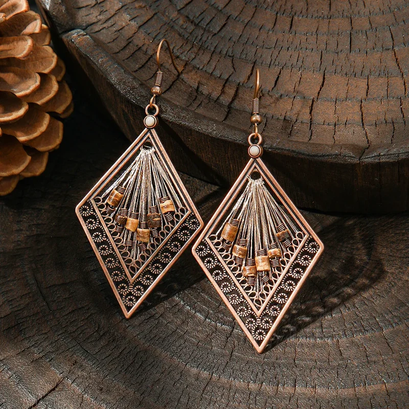 Boucles d'Oreilles avec Pompoms