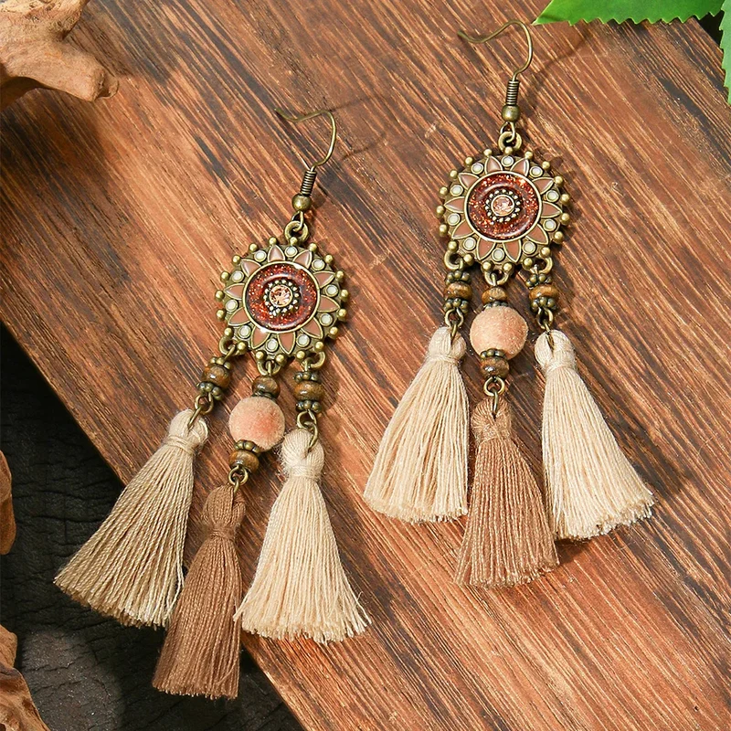 Boucles d'Oreilles avec Pompoms