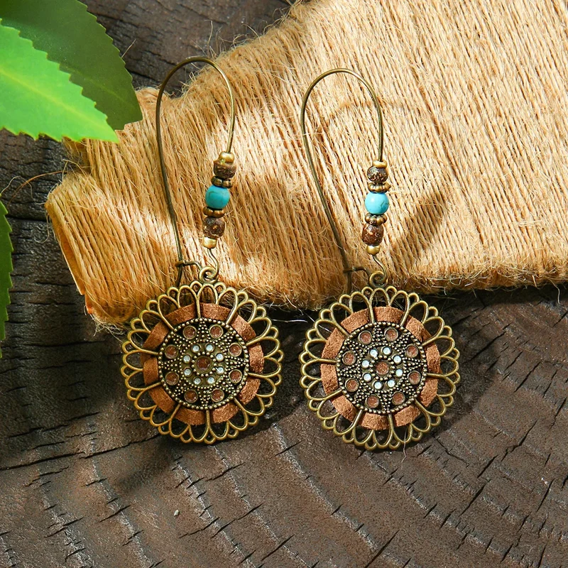 Boucles d'Oreilles avec Pompoms