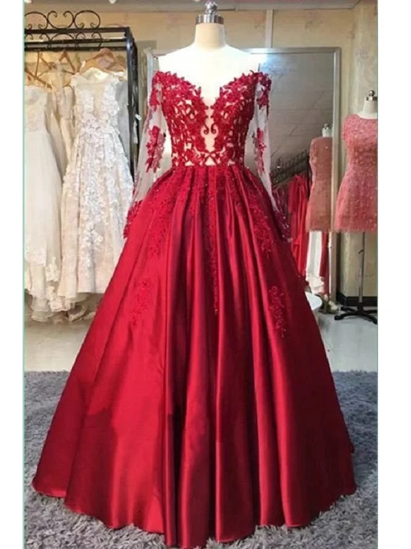 Robe de bal en satin rouge avec haut en dentelle et manches longues
