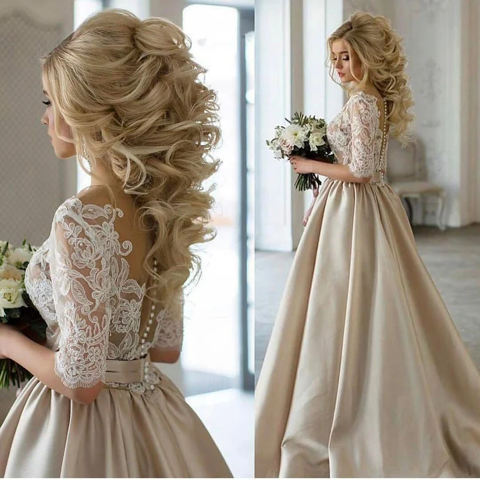 Robe de mariée champagne en dentelle transparente avec manches