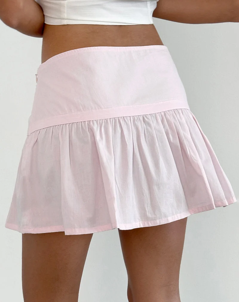 Fita - Minijupe à nœud volant en popeline rose pâle