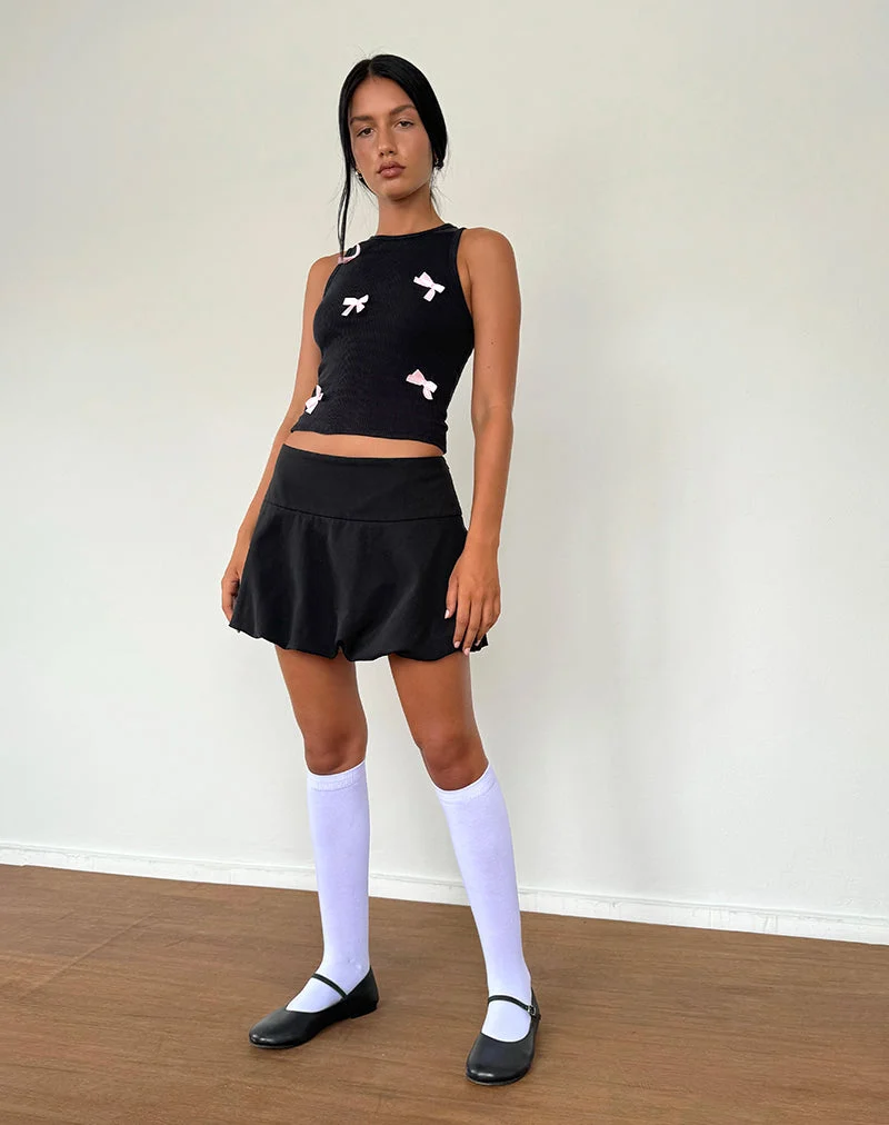 Gilet Rave noir avec nœuds roses