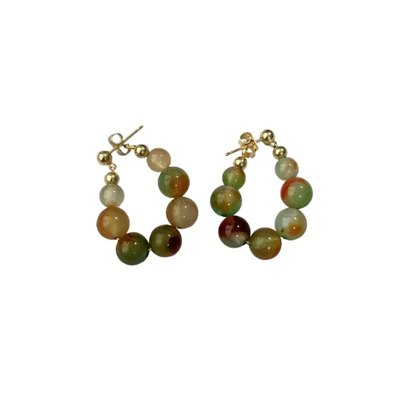 Boucles d'oreilles avec pierres vertes