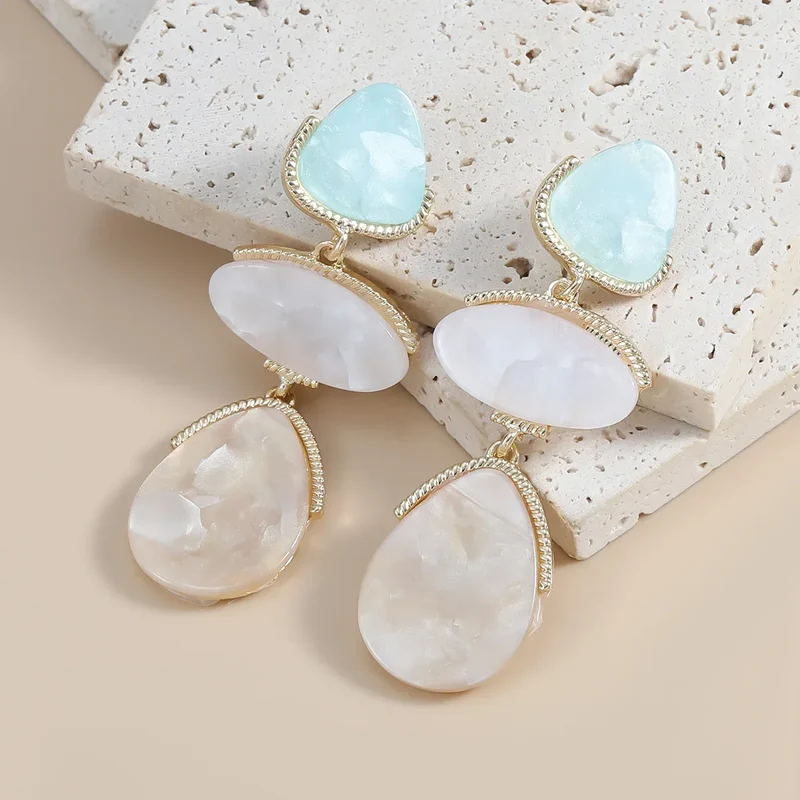 Boucles d'oreilles triple pierre