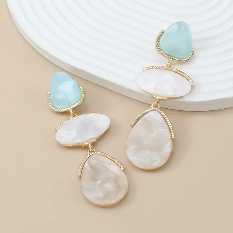Boucles d'oreilles triple pierre