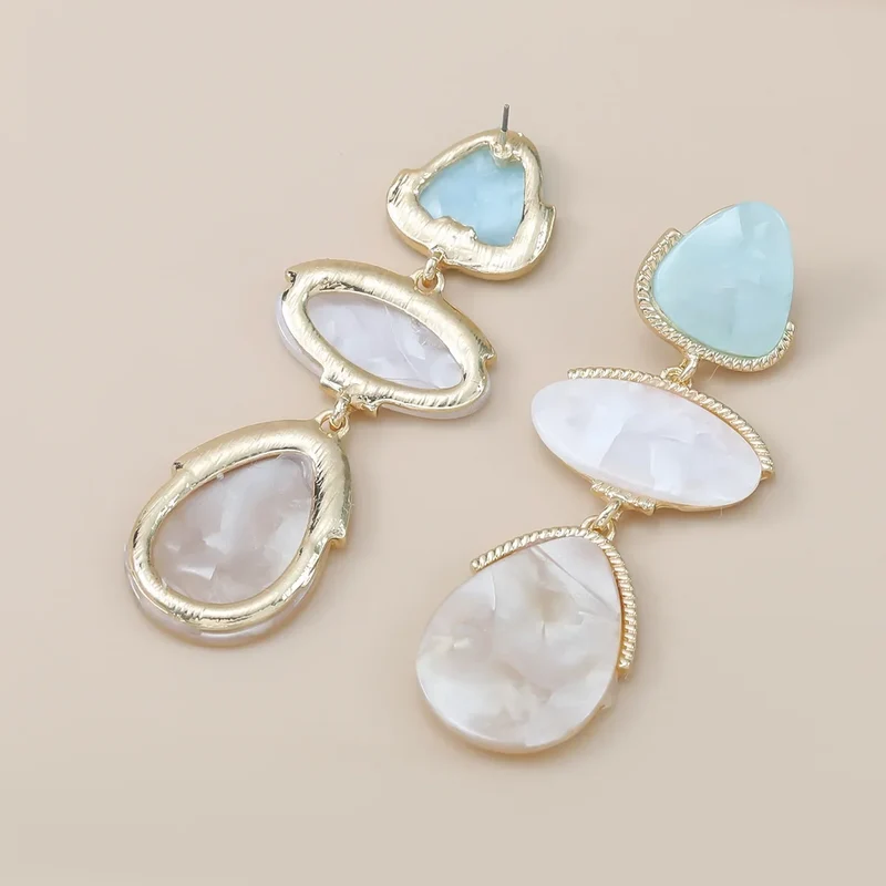 Boucles d'oreilles triple pierre