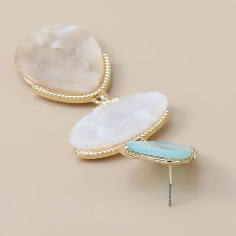 Boucles d'oreilles triple pierre