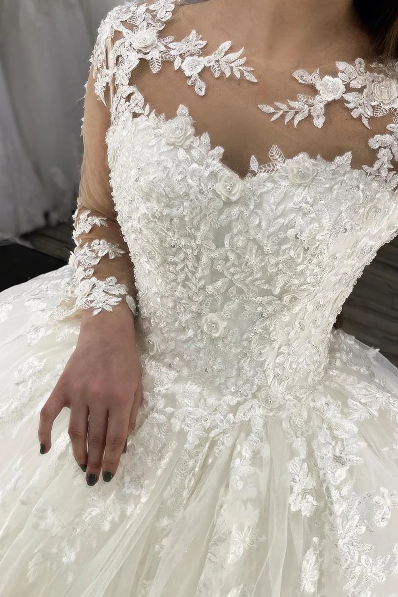 Robe de mariée en tulle transparent avec manches longues et appliques