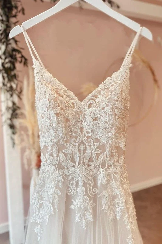 Robe de mariée trapèze en tulle à bretelles spaghetti et décolleté en cœur avec appliques en dentelle