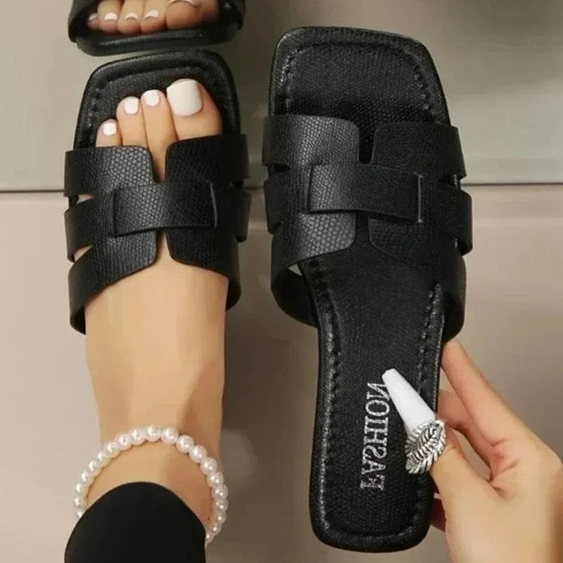 Claquettes noires pour femme
