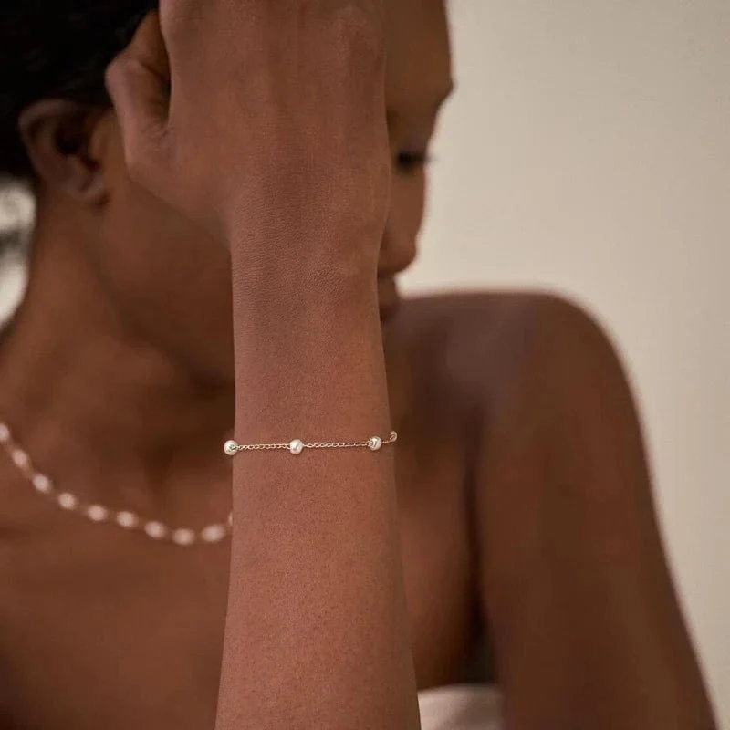 Bracelet en or avec perles