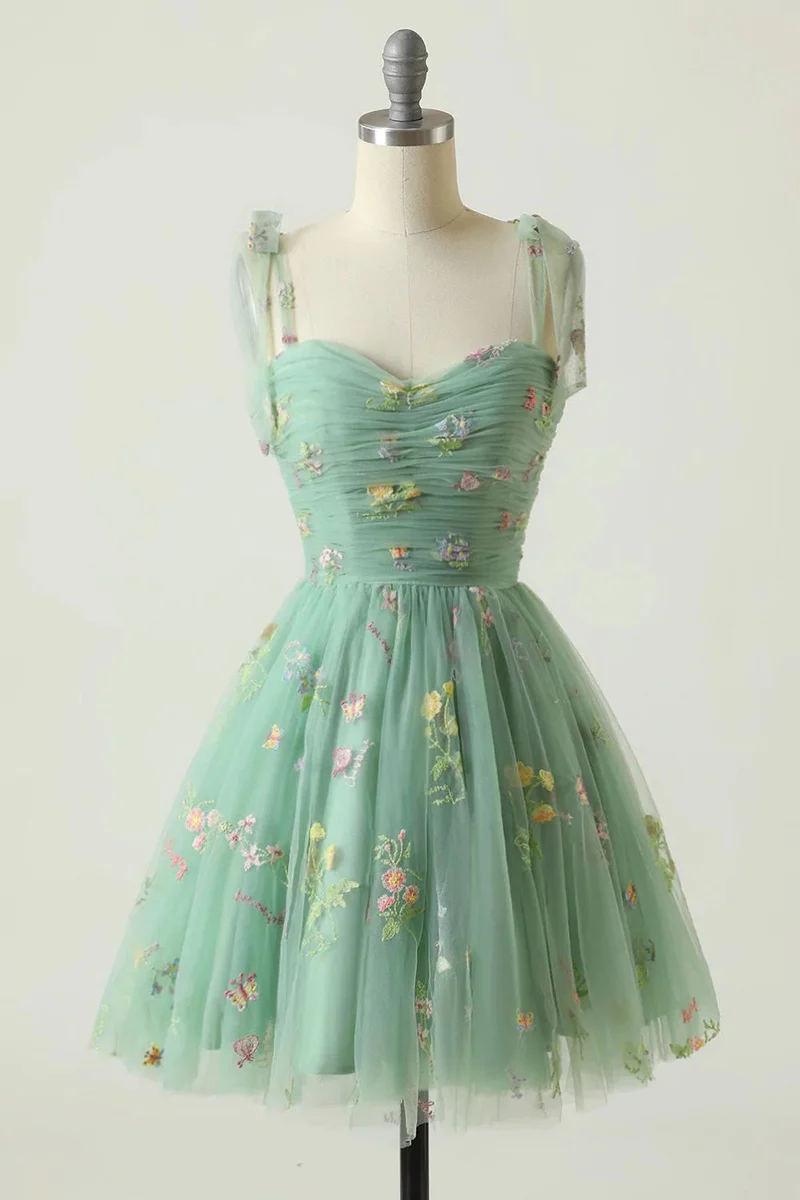 Robe de soirée trapèze verte avec broderies - Motif floral élégant