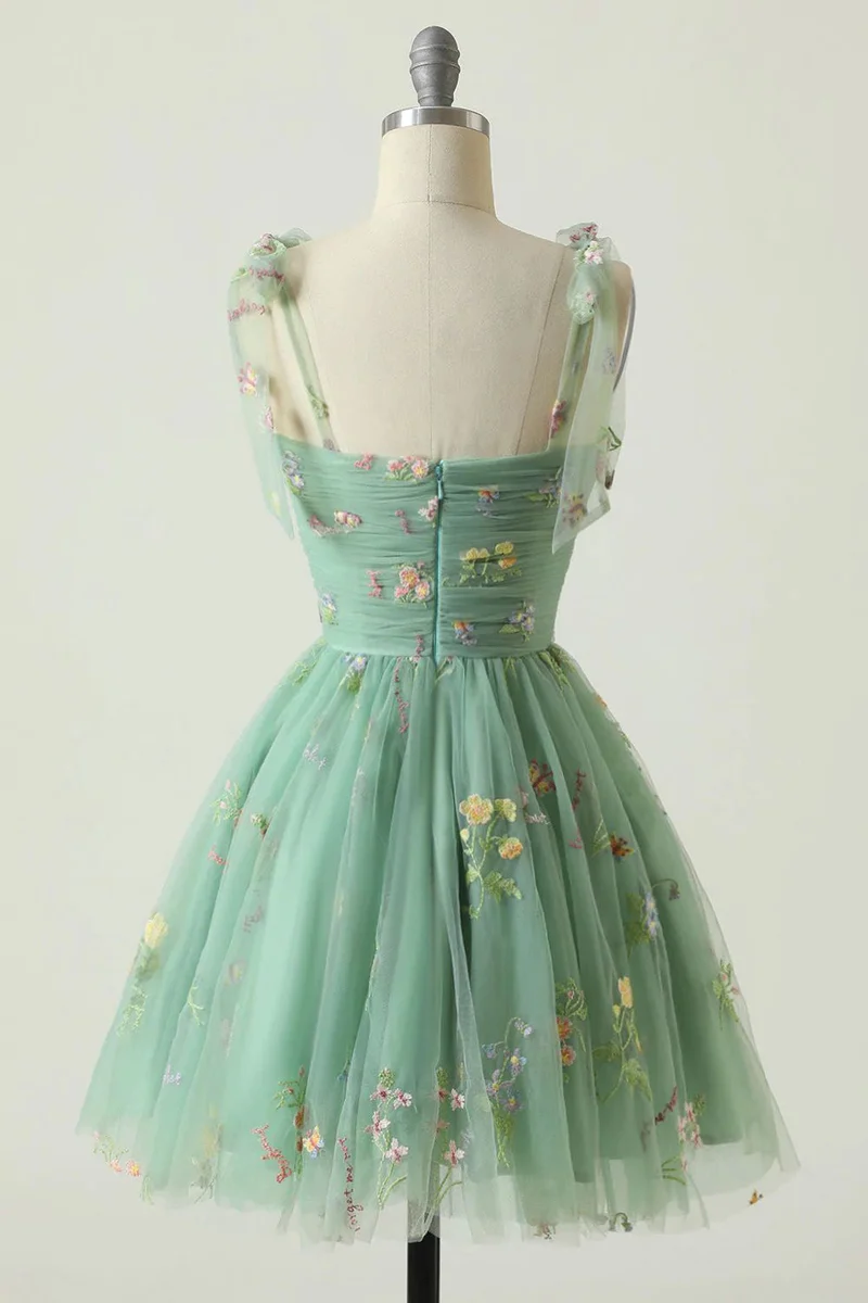 Robe de soirée trapèze verte avec broderies - Motif floral élégant
