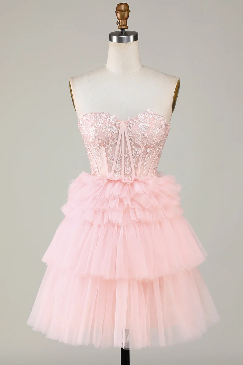 Robe de soirée trapèze rose élégante avec décolleté en cœur et volants et tulle