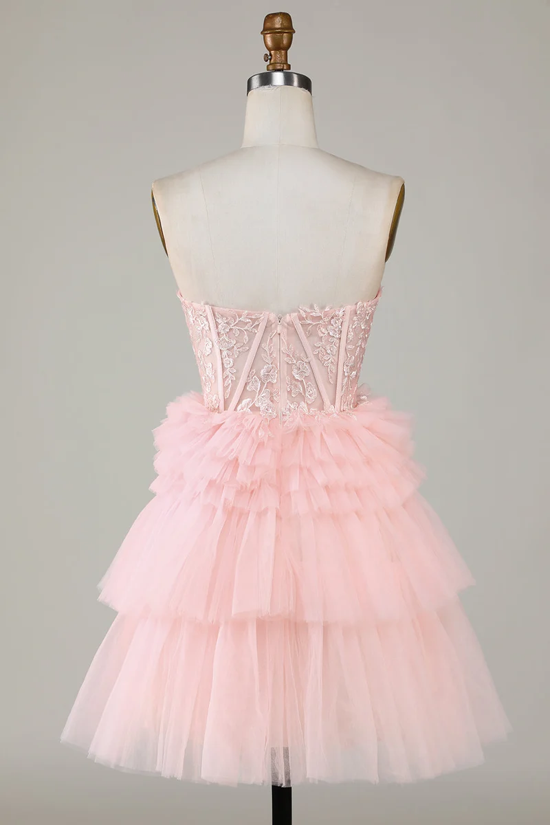 Robe de soirée trapèze rose élégante avec décolleté en cœur et volants et tulle