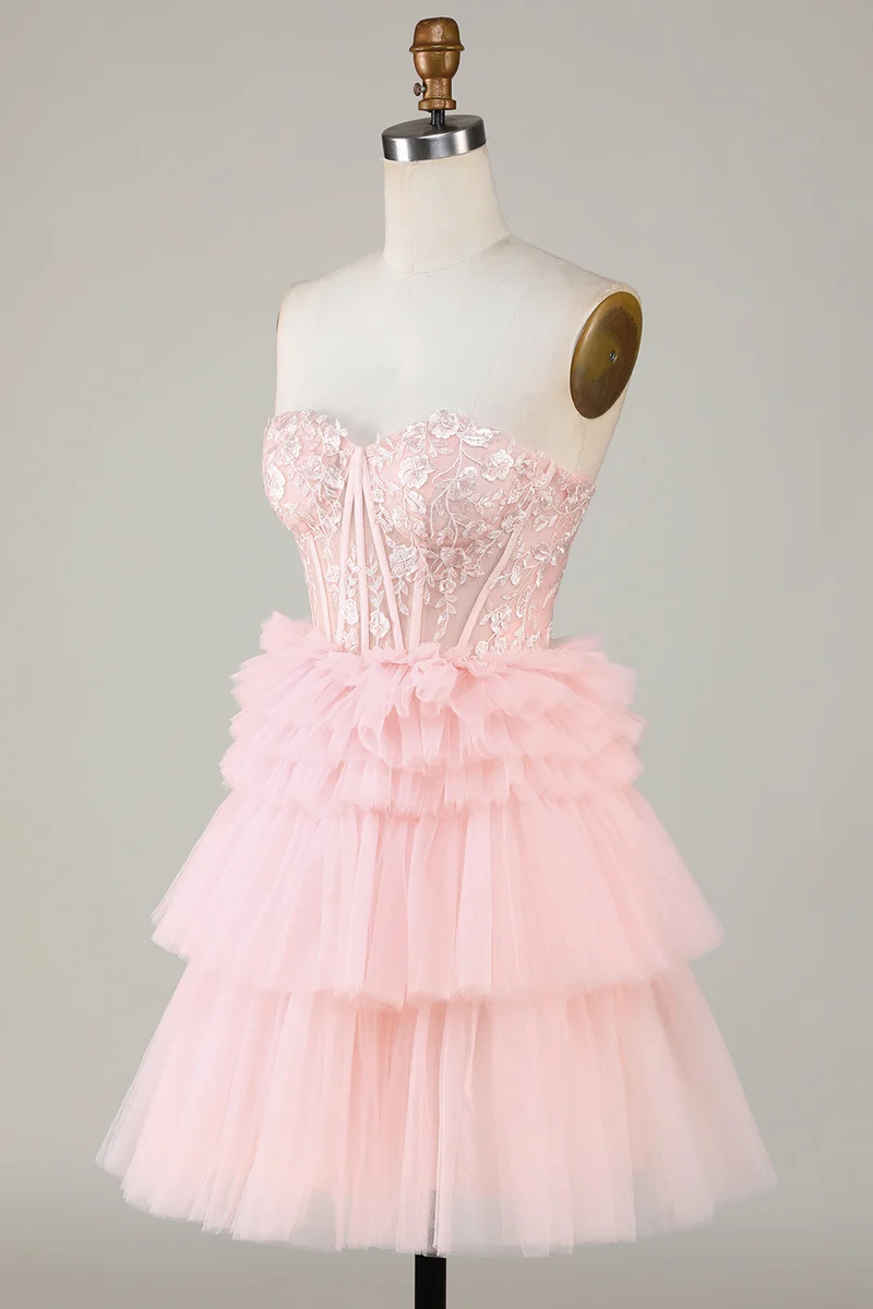 Robe de soirée trapèze rose élégante avec décolleté en cœur et volants et tulle