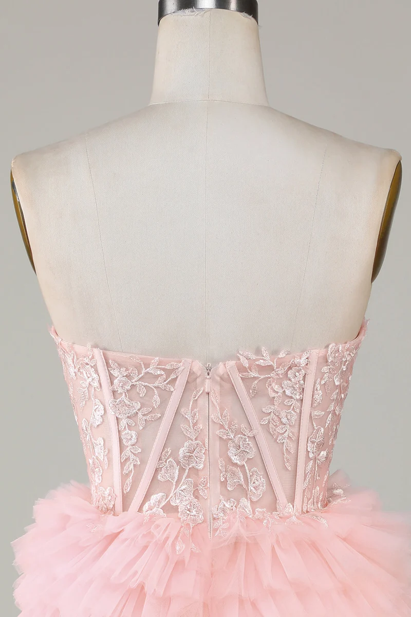 Robe de soirée trapèze rose élégante avec décolleté en cœur et volants et tulle
