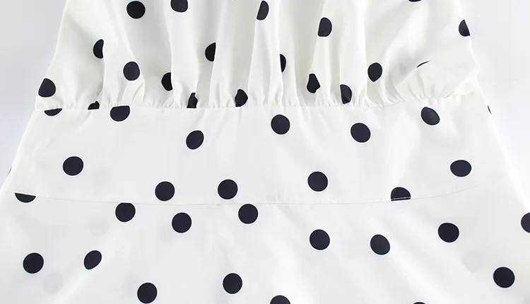 Robe mini à pois blanche et noire