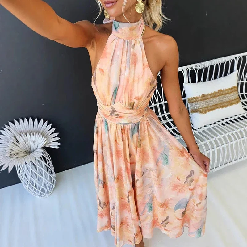 Robe d’été imprimée orange pour femme dos nu à col halter