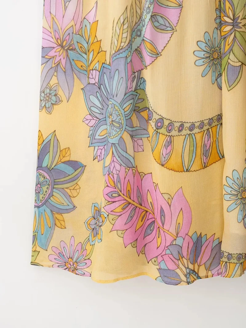 Robe d’été fluide à bretelles imprimé floral en mousseline