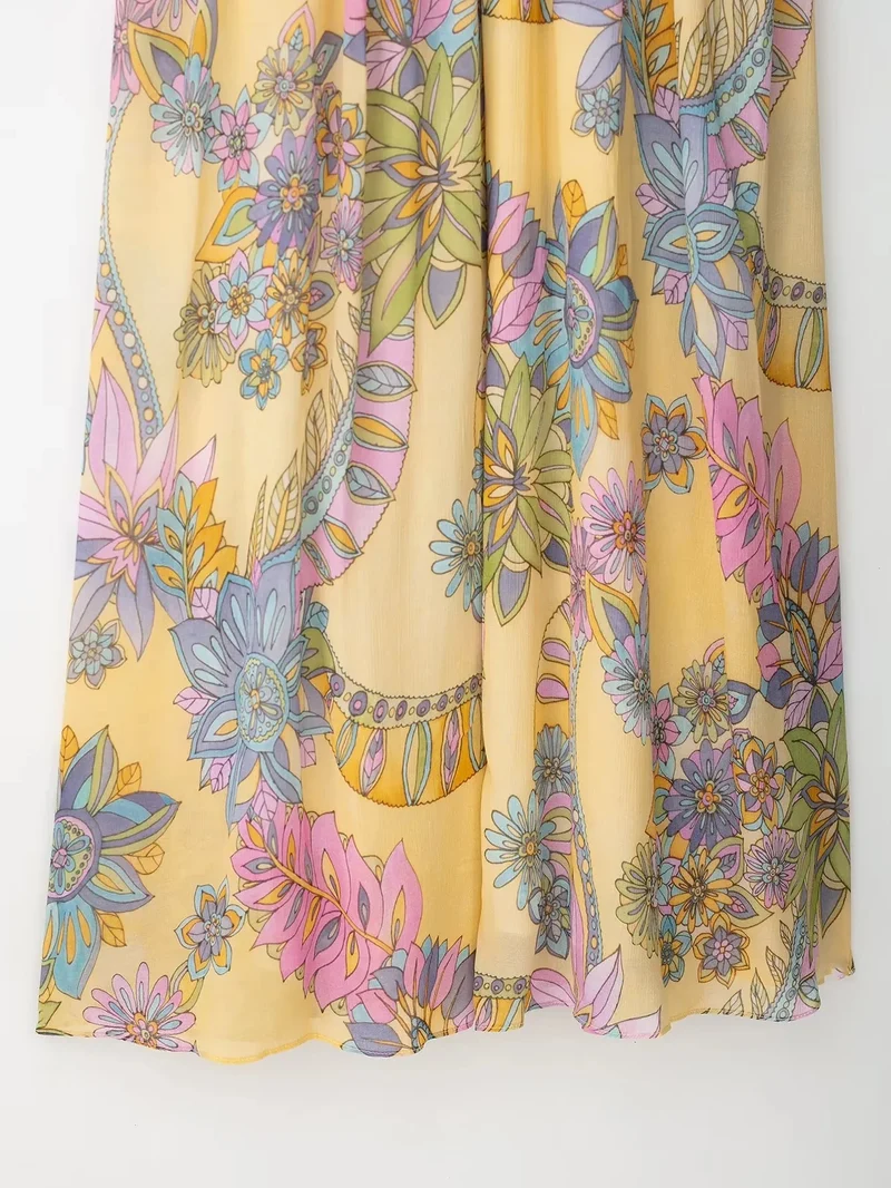 Robe d’été fluide à bretelles imprimé floral en mousseline
