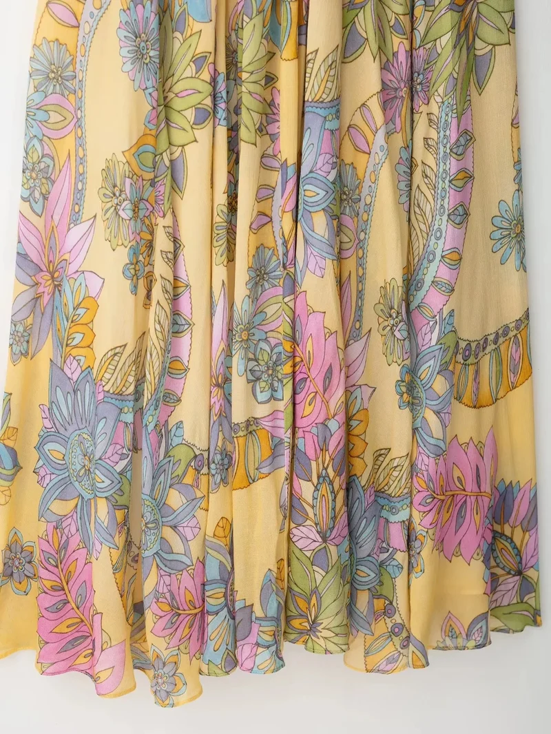 Robe d’été fluide à bretelles imprimé floral en mousseline