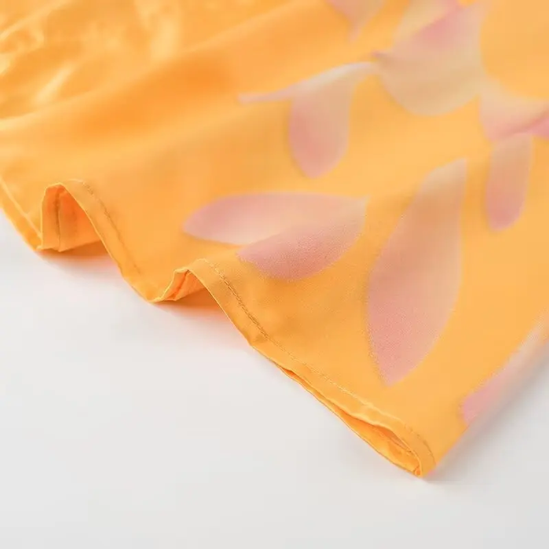 Longue robe bustier bohème chic jaune en tissu satiné
