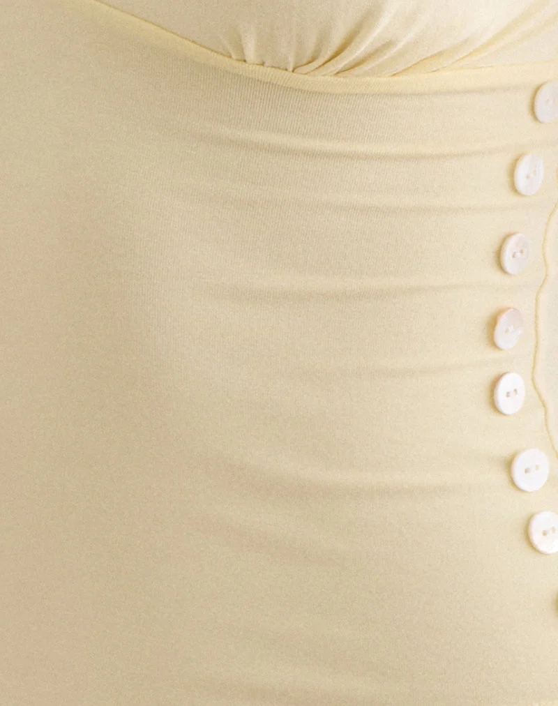 Haut Yatna en rayonne couleur citron, orné de boutons nacrés