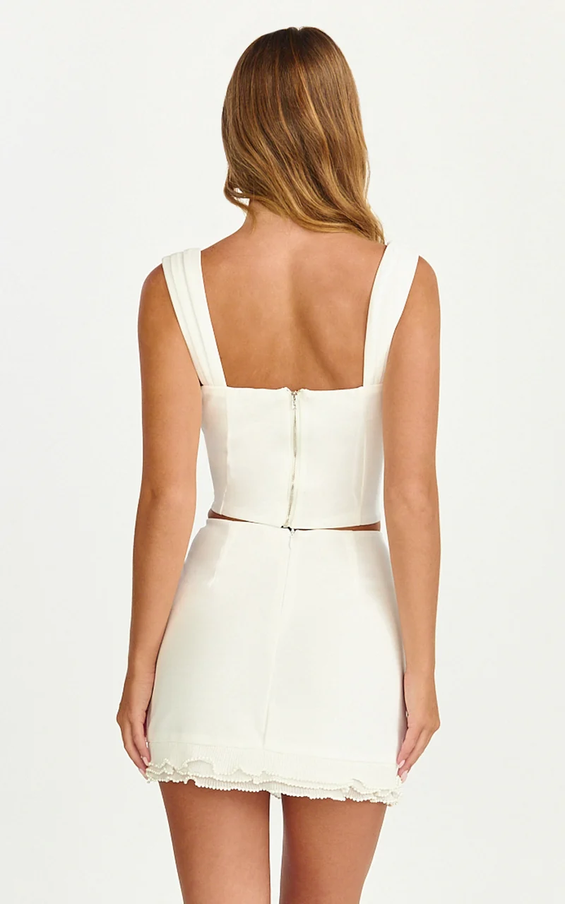 Leanna Two Piece Set - Corset Top And Pearl Flounce Trim Mini Skirt Set in White