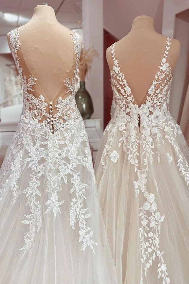 Robe de mariée élégante en dentelle, décolleté en V profond, coupe trapèze, avec appliques en tulle, longueur au sol