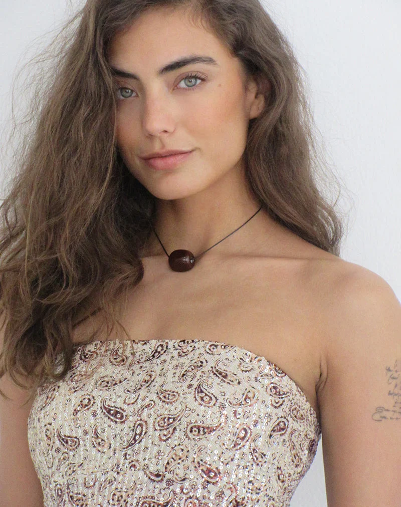 Haut bandeau Brilia à motif paisley et paillettes dorées