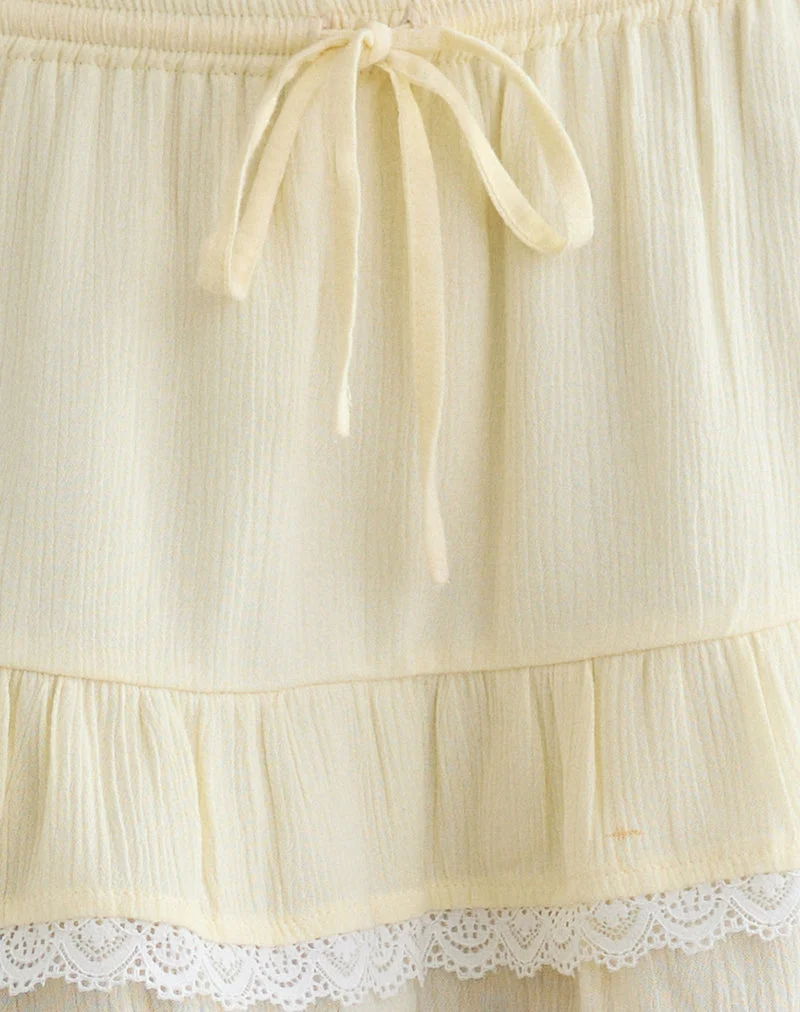 Mini-jupe Yasu à ourlet volanté, couleur jaune beurre froissé