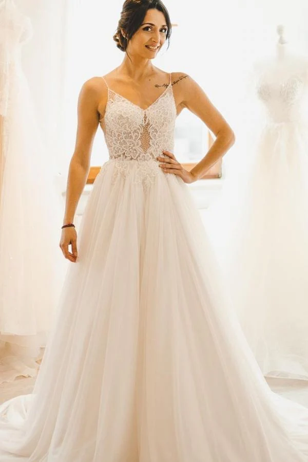 Robe de mariée élégante coupe trapèze avec bretelles spaghetti, tulle et dentelle délicate
