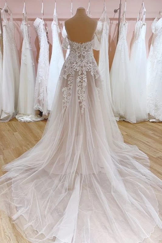 Robe de mariée élégante en tulle à épaules dénudées et traîne