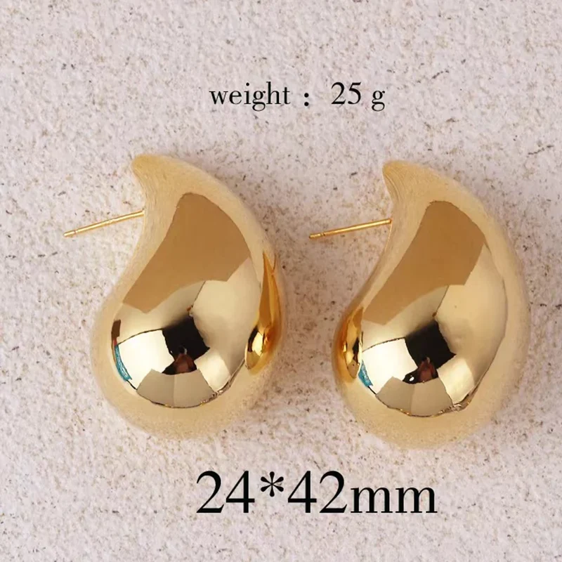 Boucles d’oreilles gouttes dorées femme