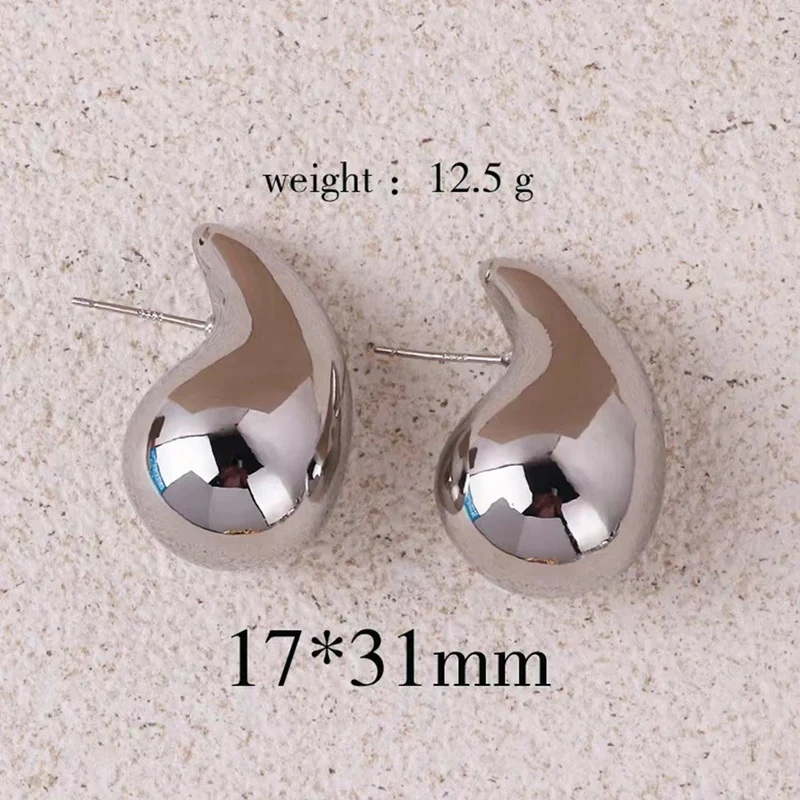 Boucles d’oreilles gouttes dorées femme