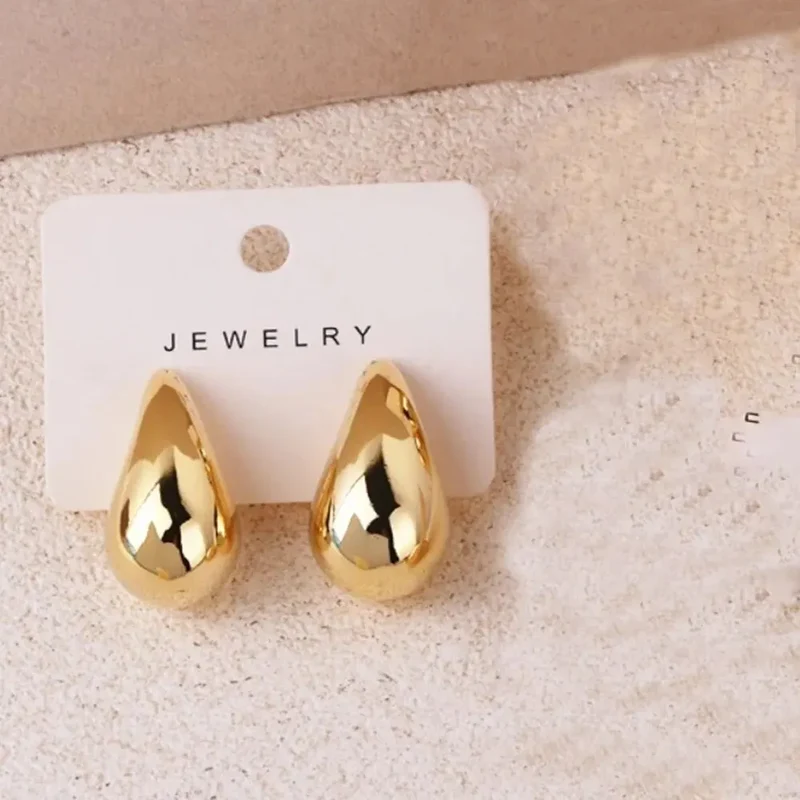 Boucles d’oreilles gouttes dorées femme
