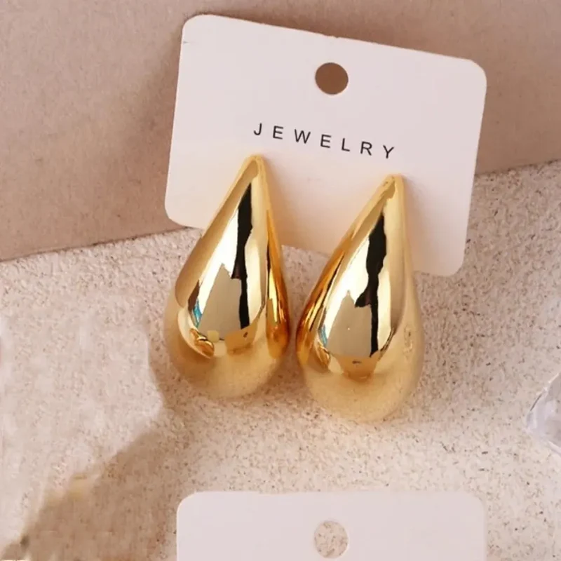 Boucles d’oreilles gouttes dorées femme