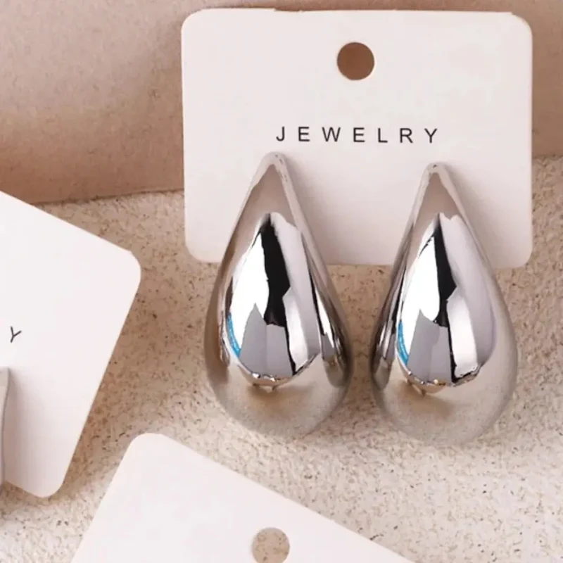 Boucles d’oreilles gouttes dorées femme