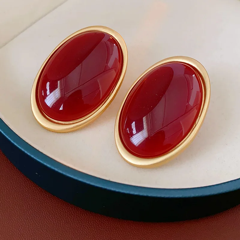Grosses boucles d’oreilles rondes vintage rouge vin