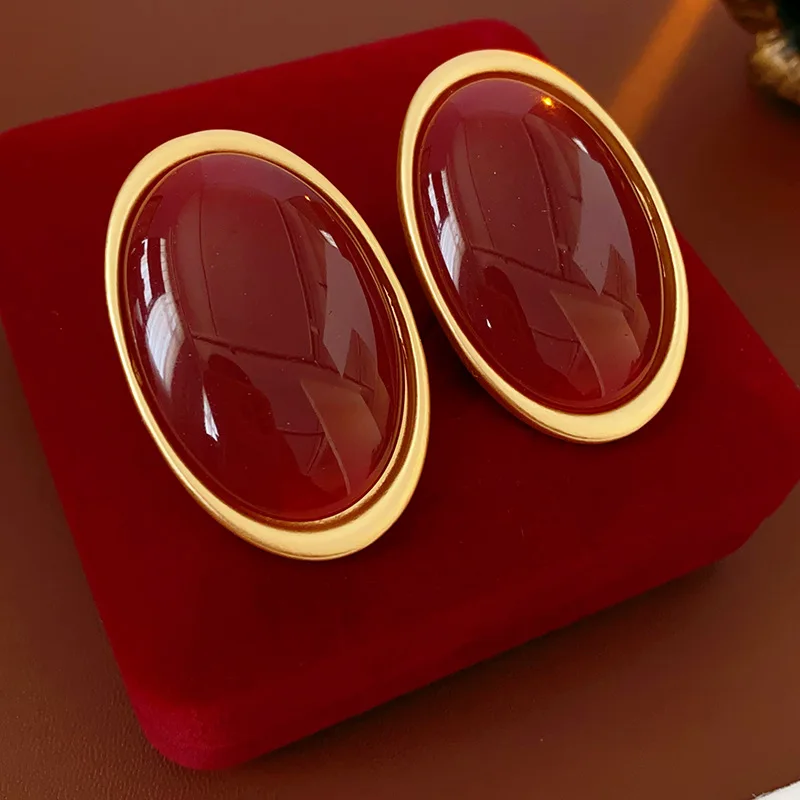 Grosses boucles d’oreilles rondes vintage rouge vin