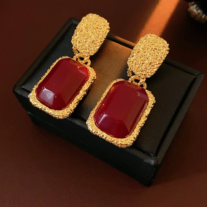 Grosses boucles d’oreilles rondes vintage rouge vin
