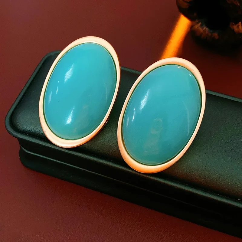 Grosses boucles d’oreilles rondes vintage rouge vin