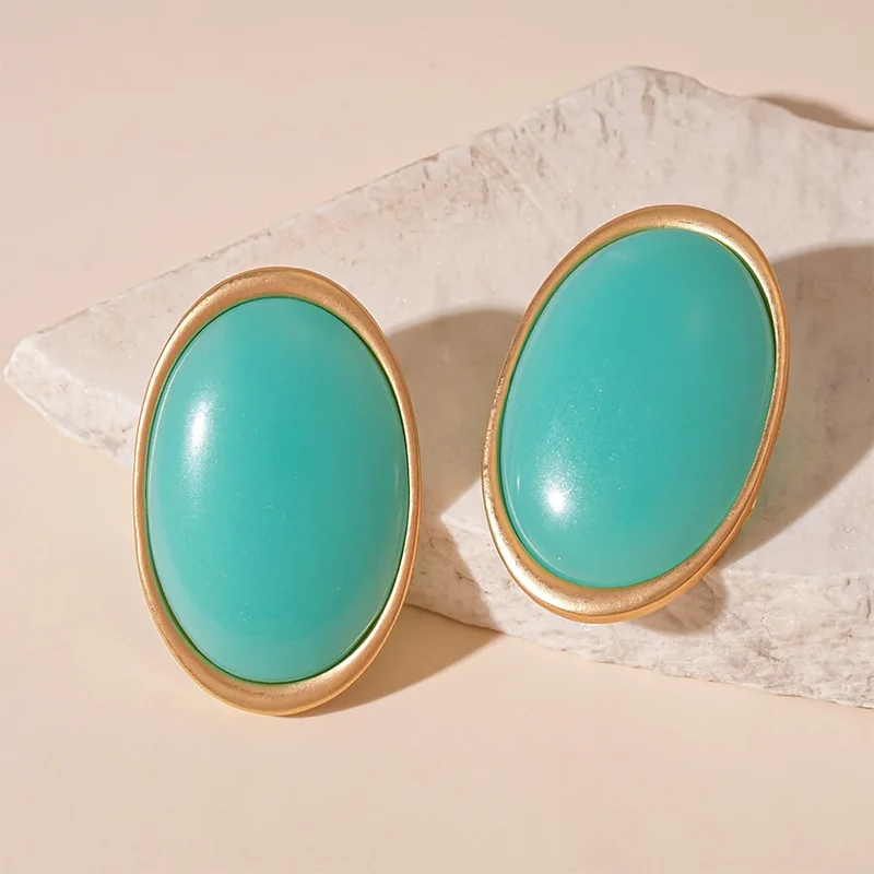 Grosses boucles d’oreilles rondes vintage rouge vin