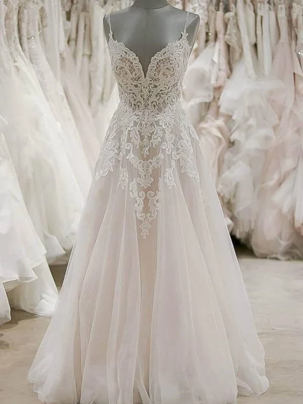 Superbe robe de mariée en dentelle à bretelles spaghetti et dos nu