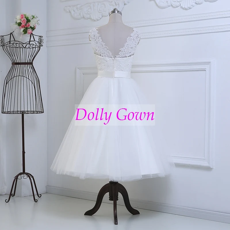 Robe de mariée modeste en dentelle, courte, longueur thé, avec bas en tulle