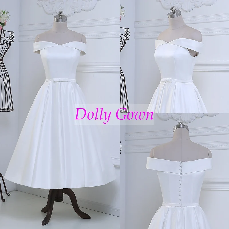 Jolie robe de mariée vintage, épaules dénudées, longueur thé, inspirée des années 50, avec joli nœud à la taille