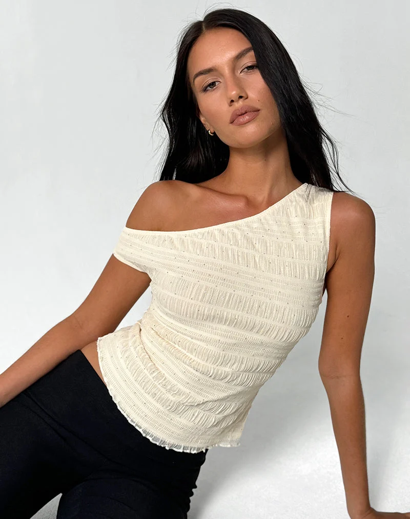 Top asymétrique Tamia en maille pailletée ivoire